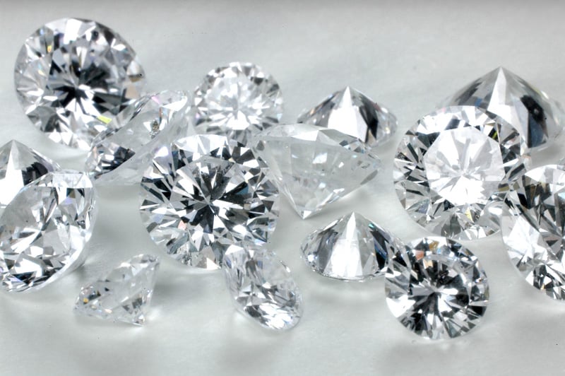 Round brilliant polished diamonds.